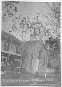 Black and white photo of church with handwritten label "Moravian Church Thurmont"