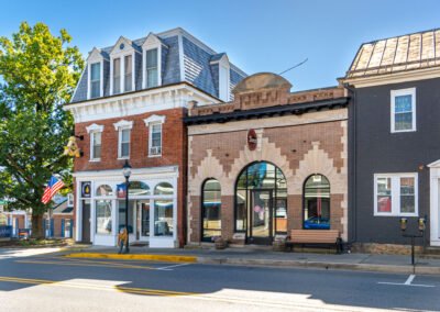 From across the street, brick tavern and Masonic Lodge row buildings